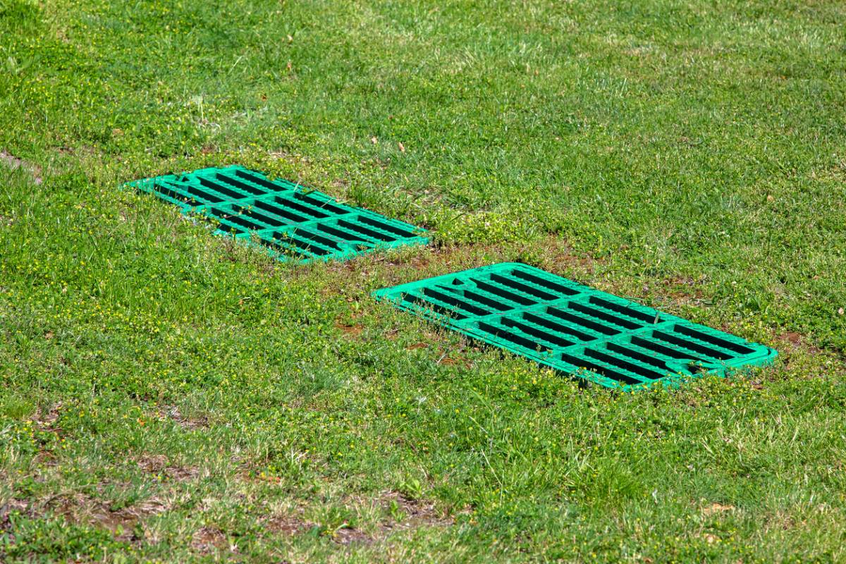 système drainage terrain sport