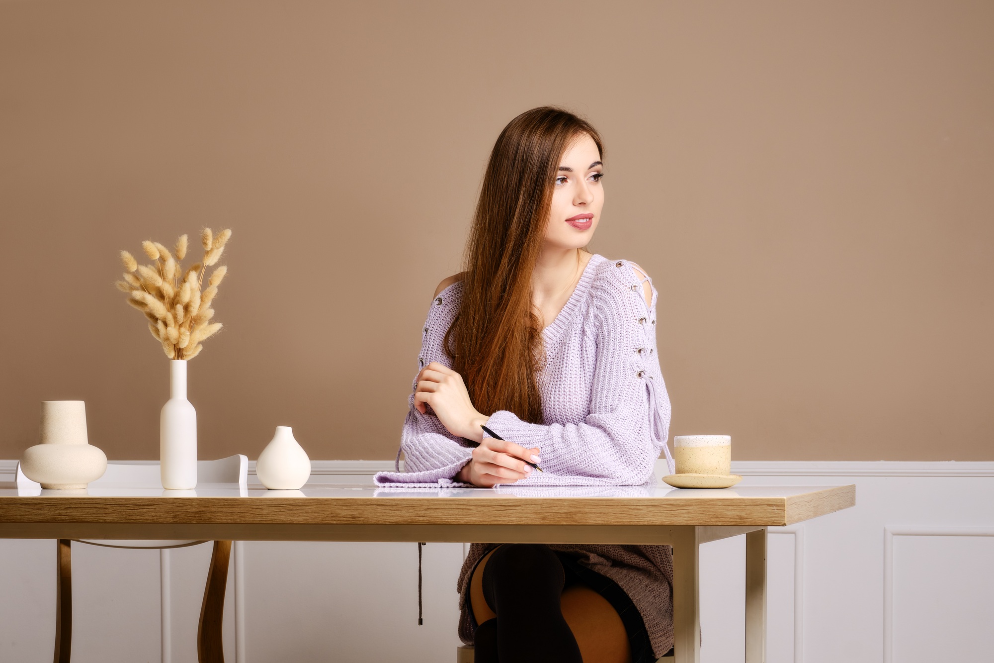 Young cheerful woman writing letter
